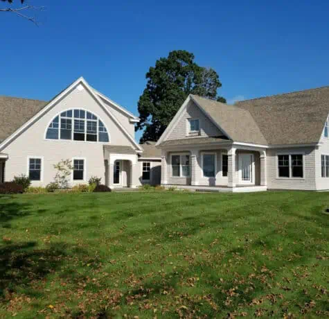 Before phot of this contemporary Cape Neddick, Me. home that was experiencing lost shingles and deteriorating granules from the salt water and sun conditions.